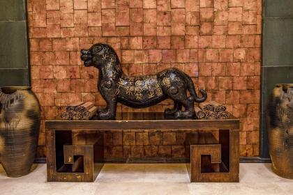 Which one is a ferocious beast, Taotie or Pixiu? What are the characteristics of ferocious beasts?