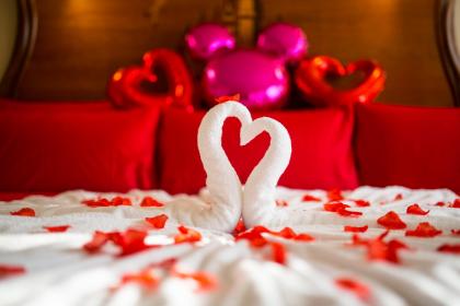 Will placing a red thread under the pillow bring love and marriage?